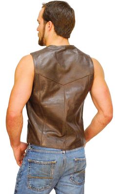 Brown leather vest in a dark brown western style. This classic dark brown vest is made of excellent high quality, top grain 1.2 mm thick soft buffalo leather. Features of this men's brown leather vest include one inside chest pocket, two front pockets, snap front and full nylon lining. This quality leather brown biker vest for men with a special rub-off finish will produce a classic worn look in a shorter period time. Ideal alternative to all those black leather out there. Sizes: 42, 44, 46, 48, Fitted Western Leather Vest, Brown Sleeveless Biker Vest, Rugged Leather Sleeveless Vest, Fitted Rugged Brown Vest, Rugged Brown Vest With Pockets, Fitted Brown Rugged Vest, Brown Rugged Vest With Pockets, Fitted Leather Vest With Rugged Style, Fitted Leather Vest In Rugged Style