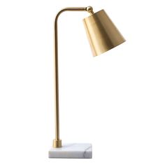 a gold lamp with a marble base on a white background, the light is turned off