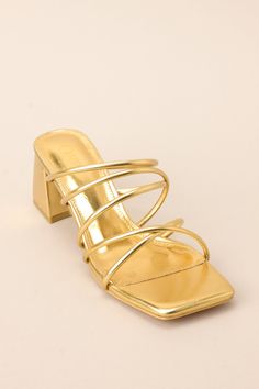 Elevate your shoe game with the Time To Move On Gold Heels. These bold beauties add a touch of shine to any outfit. Indulge in the comfort and style of these heels, perfect for any occasion. It's time to move on to a new level of fashion! These heels feature a rounded toe, a slip-on design crisscross straps across the top of the foot, and a block heel.   Heel measures 2.5" tall and 1.5" thick All Man Made Materials Non-skid sole Imported Gold Heels Prom, Red Dress Shoes, Sorority Rush Dresses, Corporate Chic, Rush Dresses, Gold Shorts, Short Heels, Time To Move On, Prom Heels