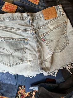 Distressed cutoff Levi 501 shorts. Size 30. Button fly. Levi's Relaxed Fit Cutoff Shorts, Levi’s Shorts 501, Levi's Mid-rise Blue Shorts, Levi's Blue Cutoff Shorts, Levi 501 Shorts, Levi 501s, Levi's Short Bottoms With Built-in Shorts, Sterling Silver Cat, Levis 501