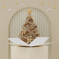 a paper boat with a christmas tree on top is floating in the air and surrounded by gold stars