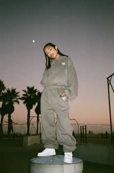 Sooo much love went in to making this sweatsuit, we had to drop a lil heart on our B logo just to show you! Buy this hoodie separate or get the whole fit by pairing with our B Love Sweats We custom made these with a more oversized look, so we recommend sizing down if you prefer your sweatsuits a lil more fitted. Oversized 90's bubble fit Poly cotton fleece blend Model is 5'0" and wearing a size medium Poses In Sweatshirt, Luxury Streetwear Women, Streetwear Fashion Campaign, Hoodie Photoshoot Ideas, Cool Photoshoot, Tomboy Swag, Sweatsuit Outfit, Streetwear Photoshoot, B Love