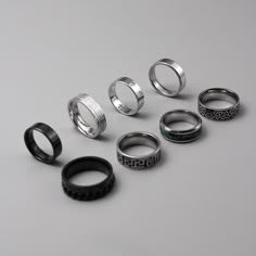 Choose from 8 of our high-quality stainless steel silver men's rings. Including: 1. Saint Cross ring 2. Celtic Knot Ring 3. Aztec Numeral Ring 4. Roman Band Ring  5. Black Classic Band Ring 6. Classic Band Ring 7.Abalone Shell Ring  8. Black Chain Ring ➤Weighty and Durable Stainless Steel ➤The perfect, versatile ring for daily wear ➤Multiple Sizes available ➤Made with High-Quality 316L Stainless Steel for a premium finish Please Note: This includes 1 ring not a full set of 8. Please pick the style that you would like from the photos. Please check our size chart in the last image before ordering. Shipping: We aim to ship your order out as soon as possible and offer Free First Class Delivery to the UK. We also offer worldwide shipping which we send with international standard delivery. Any q Minimalist Rings Men, Cheap Clavicle Chain Necklace For Valentine's Day, Guys Rings Aesthetic, Tomboy Rings, Masc Rings, Men Rings Aesthetic, Rings Streetwear, Alt Rings, Boy Rings