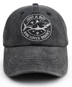 a gray hat with the words, just a boy and loves sharks on it's front