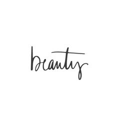 the word beauty written in black ink