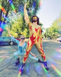 two people dressed in costumes pose for a photo