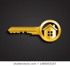 golden key with house symbol on black background