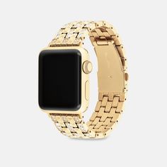 Made exclusively for use with the 38mm 40mm and 41mm Apple Watch® this dazzling gold tone link bracelet strap is etched with our Signature and detailed with pavé crystals for a sparkly touch. | Coach Apple Watch® Strap, 38 Mm, 40 Mm And 41 Mm - Women's - Gold Luxury Gold Watch Bands With Diamond Hour Markers, Elegant Gold Metal Apple Watch Band, Luxury Metal Watch Accessories, Elegant Gold Stainless Steel Apple Watch Band, Luxury Gold Diamond Watch With Bling, Modern Gold Diamond Watch With Stainless Steel, Luxury Gold Metal Watch Bands, Luxury Gold Diamond Watch With Jubilee Bracelet, Elegant Gold Diamond Watch With Rhinestones