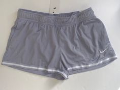 BRAND NEW WITH TAG Nike Sportswear Essentials Mesh Mid-Rise Shorts Size Women's Large (31.5" - 34.5" Waist, 41" - 44" Hip) Mid-rise waistband Elastic waist with drawcord Side pockets to store keys, cards and phone Embroidered Nike "swoosh" logo 100% polyester Inseam: 2" Nike Clothes, Embroidered Nike, Nike Swoosh Logo, Mid Rise Shorts, Active Wear Shorts, Clothes Summer, Swoosh Logo, Nike Swoosh, Easy Snacks