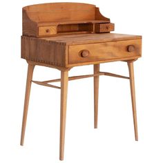 an old wooden desk with drawers on the top and bottom, sitting in front of a white background