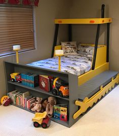 a child's bedroom with a bunk bed and toy cars on the bottom shelf