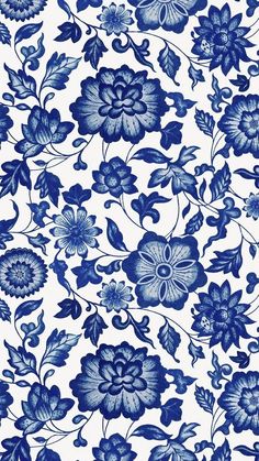 blue and white floral wallpaper with large flowers on the left side of the image