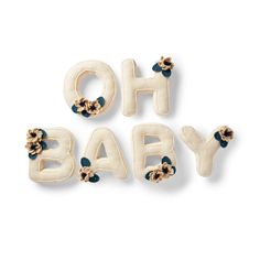 the word oh baby spelled with fabric flowers