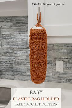 an easy crochet bag holder is hanging from the kitchen counter with text overlay that reads, easy plastic bag holder free crochet pattern