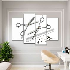 three pairs of scissors hanging on a wall in a room with a chair and potted plant