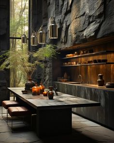 a dining room table surrounded by pots and vases