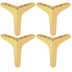 four gold metal brackets with holes in the middle and one on each side, set of three