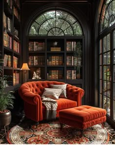 an orange chair and ottoman in a library