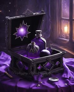 a purple box with some bottles in it on a table next to a lit candle