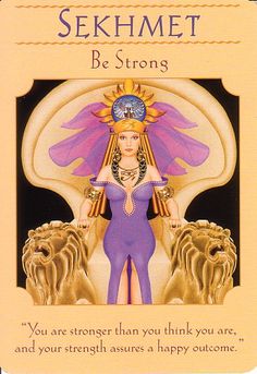 a card with an image of a woman in purple and gold on the front, surrounded by lions