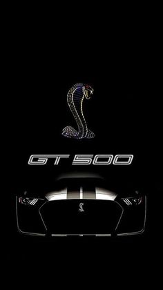 the front end of a black sports car with a snake on it's hood