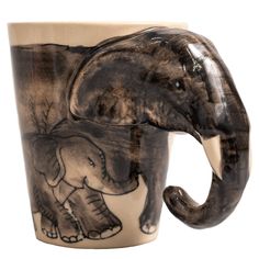 an elephant mug is shown on a white background