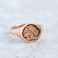 Our classic round signet has been hand engraved with a wax seal Rose. We are able to custom make any signet ring with your initials or family crest. Face measures 11mm round. Sarah Gardner, J Us, Silver Signet Ring, My Size, Family Crest, Wax Seal, Wax Seals, Hand Engraving, Signet Ring