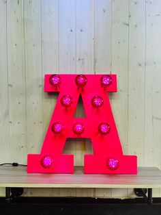 the letters are made out of plastic and have lights on them to light up the room