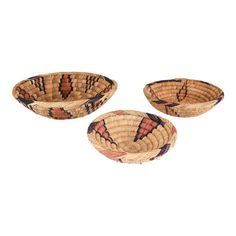 three woven baskets sitting on top of each other