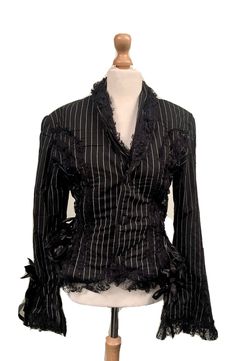 This is a stunning vintage fitted jacket by Raven clothing. It has plenty of detail with bows and black lace trim. The sides of the jacket pull in for a fitted look as it has corseted side detail . It is fully lined and well made. The sleeves are long with bell cuff , corseting and bow please refer to photos. This is an XL Uk 14 /16 chest upto 40inch This is rare limited vintage stock . Thank you for looking Wineries Outfit, Gothic Outfits, Workout Jacket, Goth Fashion, Gothic Fashion, Aesthetic Clothes, Pretty Outfits, Fashion Inspo Outfits