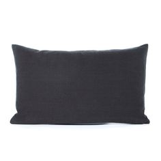 a black pillow on a white background