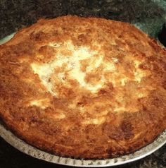 a pie sitting on top of a metal pan