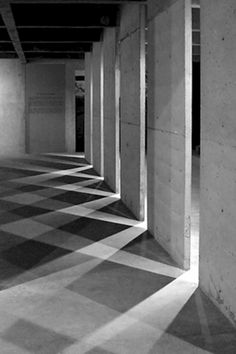 black and white photograph of an empty hallway