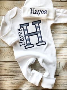 Personalized Baby Romper - Baby Shower Gift, Custom Announcement, Coming Home Outfit, Sleeper With Footies These adorable rompers and onesies are the perfect Custom Baby Shower Gift or Coming Home Outfit. Create a memorable baby announcement or pregnancy reveal with our personalized options. Each piece is a thoughtful Newborn Gift that combines comfort and charm. Why choose our Personalized Baby Romper for your Baby Shower Gift, Coming Home Outfit, or Baby Photo: Personalized Perfection: Customi Personalized Baby Gifts Boy, Hospital Clothes, Baby Going Home Outfit, Shower Baskets, Baby Boy Coming Home Outfit, Boy Coming Home Outfit, Boy Monogram, Bernina Embroidery, Personalized Onesie