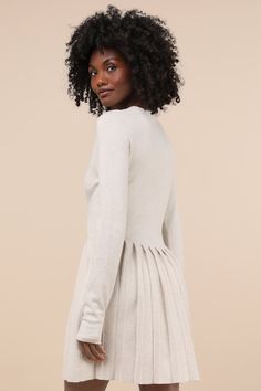 From brunch with the babes to holiday get-togethers, the Lulus Beyond Sweet Heathered Beige Pearl Pleated Mini Sweater Dress will always be admired! Stretchy sweater knit (with a heathered effect throughout) shapes this perfect little dress with a crew neckline, long sleeves, and a bodice with a dazzling, faux pearl and rhinestone button placket. The high, fitted waist sits atop a pleated skater skirt with a cute mini hem. Fit: This garment fits true to size. Length: Mid-thigh. Size medium measu Mini Sweater, Mini Sweater Dress, Little Dresses, Long Sleeve Mini, Sweater Knit, Button Placket, Always Be, Crew Neckline, Skater Skirt