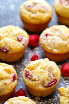 raspberry muffins with powdered sugar on top