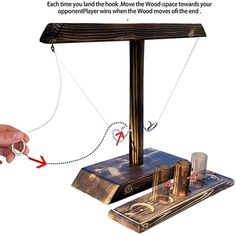 Experience endless fun with our Wooden Ring Toss Game, perfect for home bars and parties. This handmade game features a classic design where players try to land a ring on a hook. Ideal for indoor and outdoor settings, it’s great for friends, couples, and family. Easy to assemble and portable, it includes a rope, ring, and hook. Made from high-quality wood with a rugged look, it’s suitable for ages 12 and up. Note: Color may vary slightly, and a slight odor may be present initially. Enjoy fast-paced, interactive gameplay with this addictive and exciting game! Ring Hook Game, Ladder Game, Hook Game, Garage Party, Ladders Game, Throwing Games, Wooden Board Games, Ring Hook, Ring Toss Game