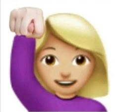 a woman with blonde hair and big brown eyes is raising her arm in the air