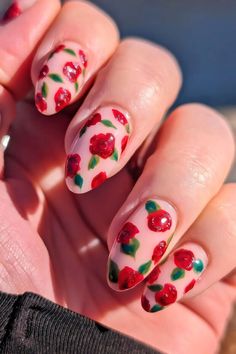 Pink background with intricately designed red roses on nails Pink Tulip Nails, Paisley Nails Design, Red Roses Nails, Roses On Nails, Rose Flower Nails, Pink Rose Nails, Lana Del Rey Nails, Rose Nail Art Designs, Roses Nail Art