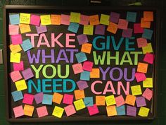 a bulletin board with post - it notes on it that says, take give what you need can