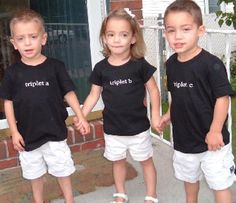 three young children are holding hands and standing on the front steps of a house, wearing t - shirts that say utopia