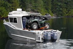 a truck on top of a boat in the water