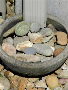 there is a pot with rocks in it