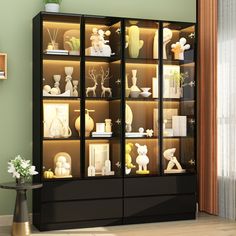 a display case filled with lots of different types of vases and other things in it