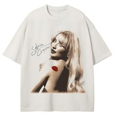 a white t - shirt with an image of a woman's face on it