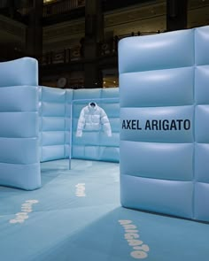 a man is standing in front of an exhibit