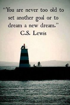 a lighthouse with a quote on it that says you are never too old to set another goal or to dream a new dream c s lewis