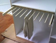 an image of a rack with pants hanging from it's sides on pinterest