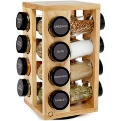 a wooden spice rack filled with spices and seasonings