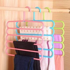 a rack with several pairs of socks hanging on it's sides and the words ebay below it